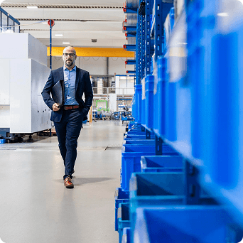 Nour Transport delivery driver inside the warehouse